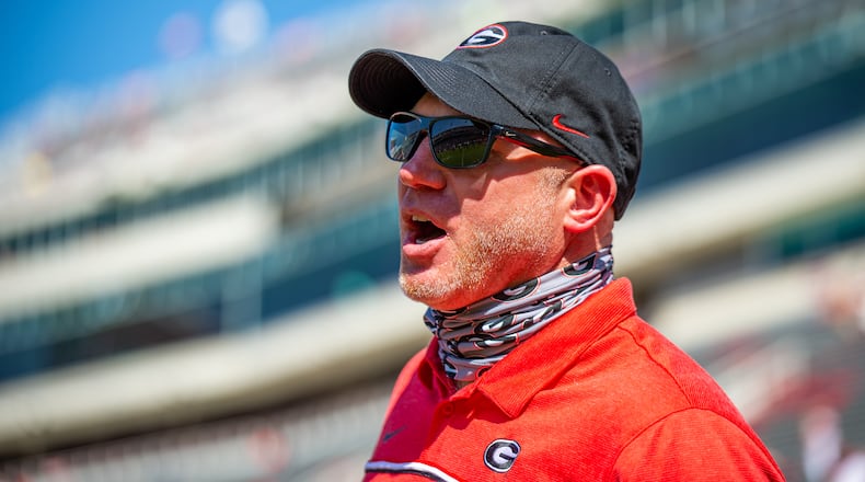 Georgia assistant football coach Scott Cochran shouts instructions to his charges as the Bulldogs get ready to play Arkansas on Saturday, Sept. 26, 2020, in Fayetteville, Ark. (Photo from UGA Athletics)
