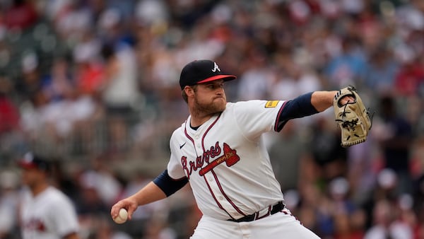 Atlanta Braves pitcher Bryce Elder (55) works against the San Francisco Giants in the first inning of a baseball game, Monday, July 21, 2025, in Atlanta. (AP Photo/Mike Stewart)