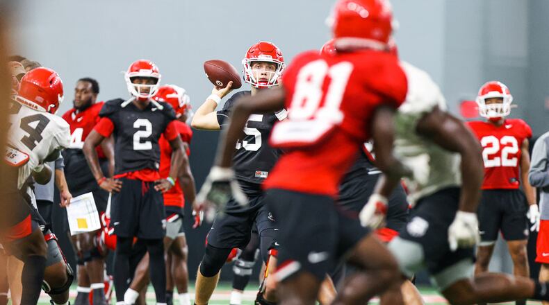 Georgia quarterback Carson Beck (15) takes snaps during the Bulldogs’ practice session Friday, Sept. 18, 2020, in Athens. (Tony Walsh/UGA Sports)
