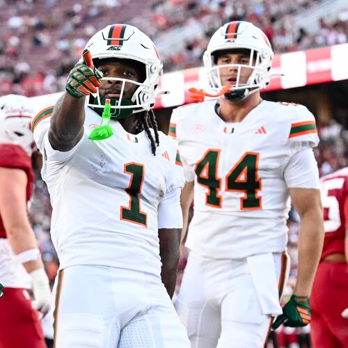 Miami wide receiver Malachi Toney (1) reacts after scoring a touchdown against Stanford during the first half of an NCAA college football game Friday, Sept. 4, 2026, in Stanford, Calif. (AP Photo/Thien-An Troung)