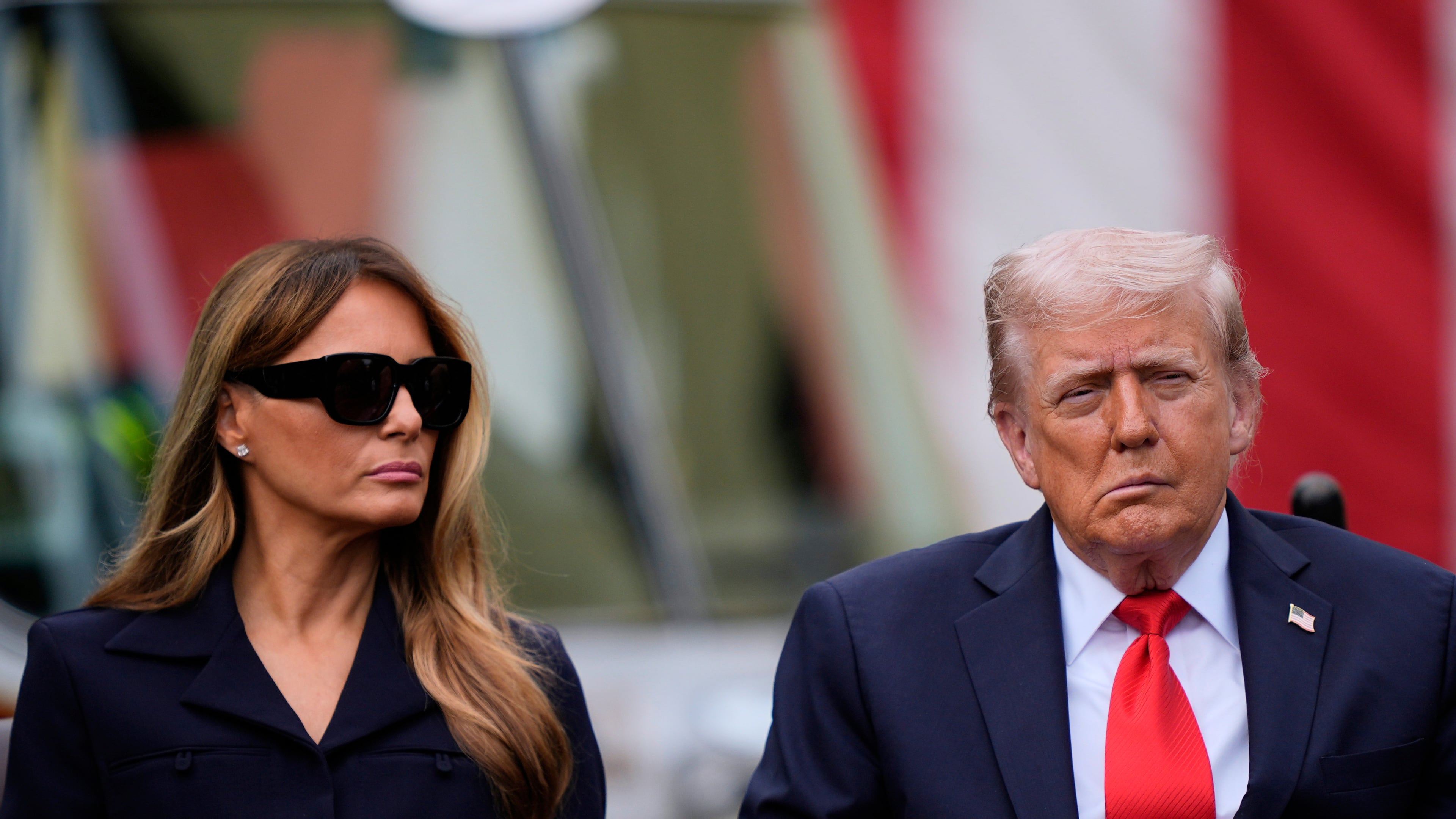 President Donald Trump and first lady Melania Trump listens as names are read as they attend a ceremony at the Pentagon to commemorate the 24rd anniversary of the 9/11 attacks, Thursday, Sept. 11, 2025, in Washington. (AP Photo/Julia Demaree Nikhinson)