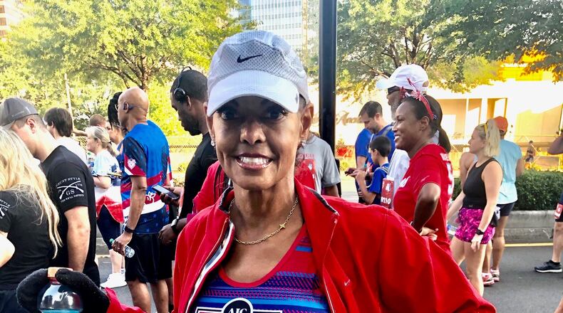 Lovette Russell completes The Atlanta Journal-Constitution Peachtree Road Race on July 4, 2021, just a few days after the second anniversary of her double lung transplant. Russell is battling scleroderma, an autoimmune disease that causes a tightening of the skin and connective tissue. (Courtesy of Lovette Russell)