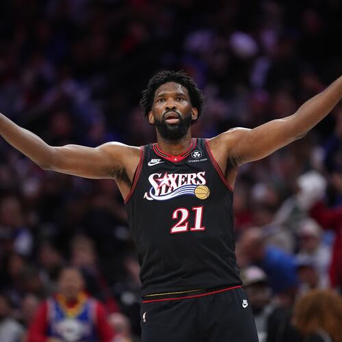 Philadelphia 76ers' Joel Embiid reacts during the first half of Game 4 against the Boston Celtics in a first-round NBA basketball playoffs series Sunday, April 26, 2026, in Philadelphia. (AP Photo/Matt Slocum)