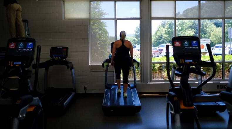 Emily Stevens works out at the YMCA in Gainesville on her day off, Monday, June 20, 2022. (Arvin Temkar / arvin.temkar@ajc.com)