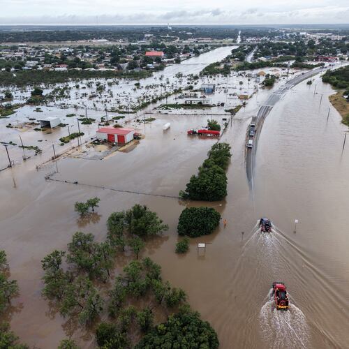 An aerial views shows flooding on Friday, July 17, 2026, in Ozona, Texas. (AP Photo/Gerald Herbert)