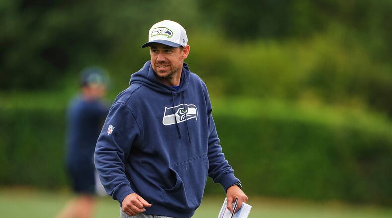FILE - Seattle Seahawks offensive coordinator Klint Kubiak walks on the field during the NFL football team's training camp July 26, 2025, in Renton, Wash. (AP Photo/Lindsey Wasson, File)