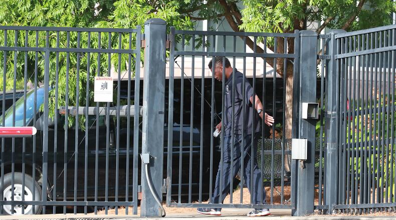 An ICE enforcement officer arrives at the U.S. Immigration and Customs Enforcement office in Atlanta on Sunday. Curtis Compton/ccompton@ajc.com