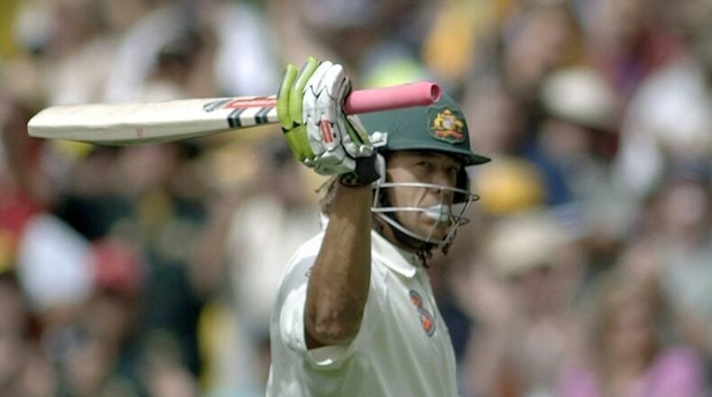 Australian Andrew Symonds, batting for Australia, salutes the crowd at the Melbourne Cricket Ground in Melbourne, Australia in 2006. A November U.S. tour will introduce cricket to American fans.
