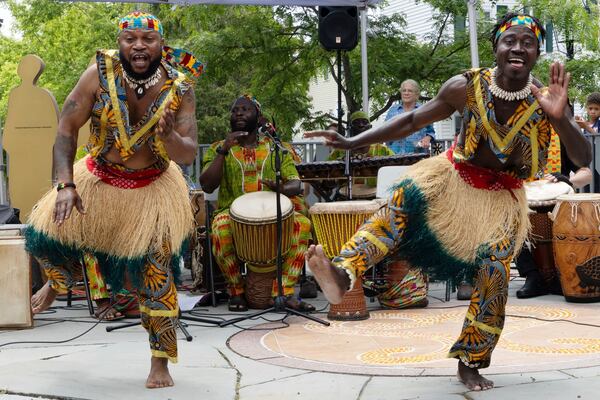 Members of the Akwaaba Ensemble Nii Osenda, left, and Samuel Marquaye dance during a Juneteenth celebration at the African Burying Ground Memorial Park Thursday, June 19, 2025, in Portsmouth, N.H. (AP Photo/Michael Dwyer)