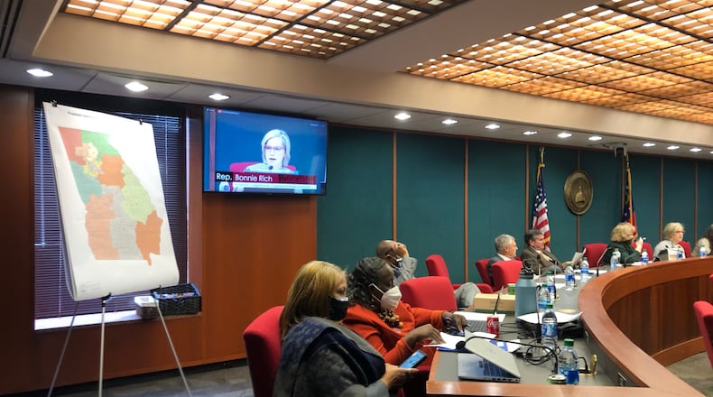The House Redistricting Committee voted Saturday to advance a new map for Georgia's congressional delegation that would give Republicans a 9-5 advantage over Democrats. Committee Chairwoman Bonnie Richis pictured speaking about the map during a Thursday hearing. (Mark Niesse/mark.niesse@ajc.com)
