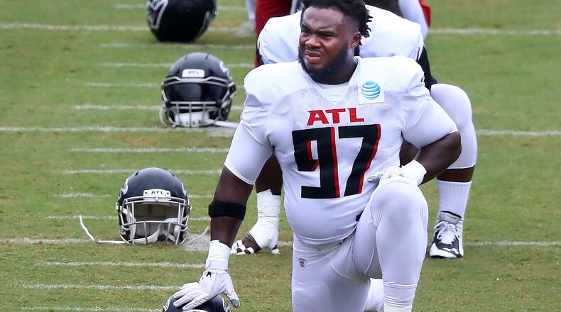 Falcons defensive tackle Grady Jarrett loosens up for the team's second scrimmage Monday, Aug. 24, 2020, in Flowery Branch.
