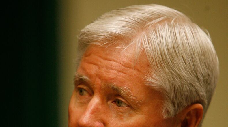 100727 Atlanta — Attorney Tex McIver says he shot and killed his wife by accident as they rode in their SUV near Piedmont Park on Sept. 25. New law enforcement records show McIver was charged in a 1990 shooting incident in DeKalb County involving three teens.