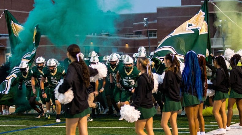 The Ola High School football team takes the field for its game against Jones County, Sept. 6, 2024.