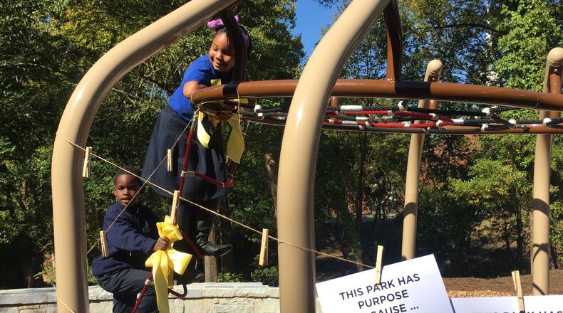 At the opening of Lindsay Street Park, the first public greenspace in English Avenue, Atlanta Mayor Kasim Reed took time to warn real estate speculators to clean up their acts. (KATIE LESLIE / KLESLIE@AJC.COM) (KATIE LESLIE / KLESLIE@AJC.COM)