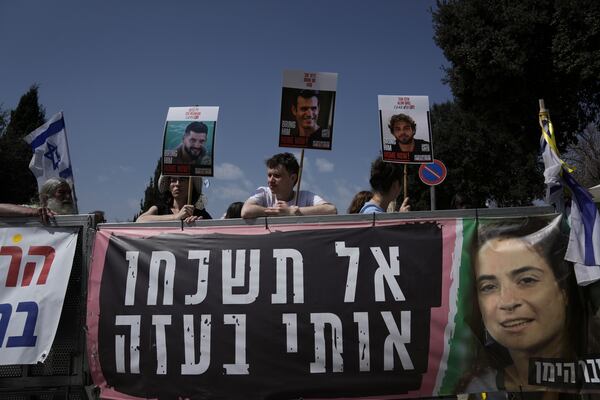 Israels calling for the release of hostages held in the Gaza Strip and saying the resumption of fighting in Gaza puts their loved ones at risk, outside the Knesset, Israel's parliament, in Jerusalem, Tuesday, March 18, 2025. (AP Photo/Mahmoud Illean)
