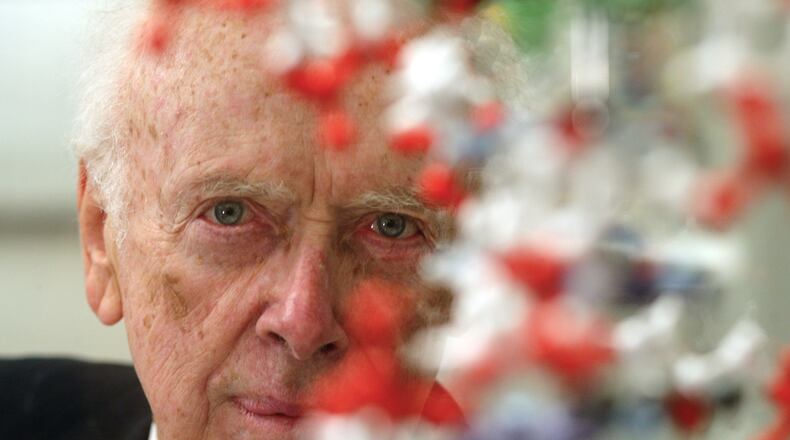 FILE - U.S. biologist James Watson, who shared a Nobel prize for helping discover the double-helix shape of the DNA molecule, poses for a portrait at an exhibition in Berlin on Monday, Oct. 11, 2004. (AP Photo/Markus Schreiber, File)