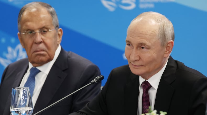 Russian President Vladimir Putin, right, and Russian Foreign Minister Sergey Lavrov, attend the talks with Indonesian President Prabowo Subianto on the sidelines of the Eastern Economic Forum in Vladivostok, Russia, Thursday, Sept. 3, 2026. (Vyacheslav Prokofyev/Sputnik, Kremlin Pool Photo via AP)