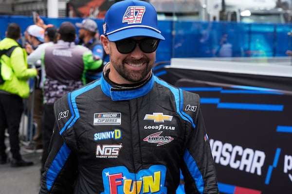 Ricky Stenhouse Jr. walks to his car before a NASCAR Cup Series auto race at Hermanos Rodríguez race track in Mexico City, Sunday, June 15, 2025. (AP Photo/)