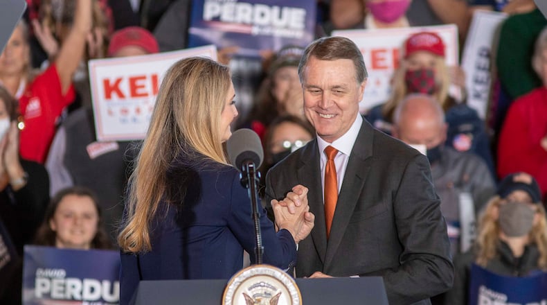 A Fulton County special purpose grand jury that investigated efforts to overturn the 2020 presidential election recommended charges against former U.S. Sens. Kelly Loeffler and David Perdue, but they were not included in a 41-count indictment that District Attorney Fani Will brought against former President Donald Trump and 18 of his allies. The special grand jury's report, which was released Friday, The report, the result of an investigation that spanned nearly eight months, doesn’t specify what specific actions led the majority of the 23-person grand jury to support charges against Loeffler and Perdue. (Alyssa Pointer/Atlanta Journal-Constitution/TNS)