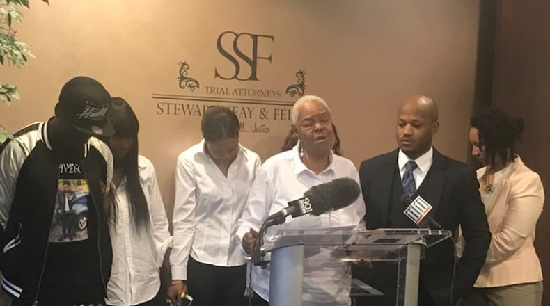 Friday, Feb. 24 - Deaundre Phillips’ grandmother, Deborah Hall, spoke to the media while flanked by family members and her attorney, Chris Stewart. CHRISTIAN BOONE/CBOONE@AJC.COM