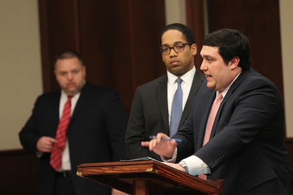 Assistant District Attorney David Emadi makes opening remarks about during the sentencing hearing for Jose Torres and Kayla Norton. In the background are District Attorney Brian Fortner (left) and Assistant District Attorney Norman Barnett (center). (HENRY TAYLOR / HENRY.TAYLOR@AJC.COM)