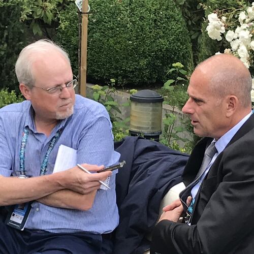Howard Fendrich, left, Associated Press national sports writer, interviews former French tennis player Guy Forget at the 2019 French Open tennis tournament in Paris. (AP Photo/Andrew Dampf)