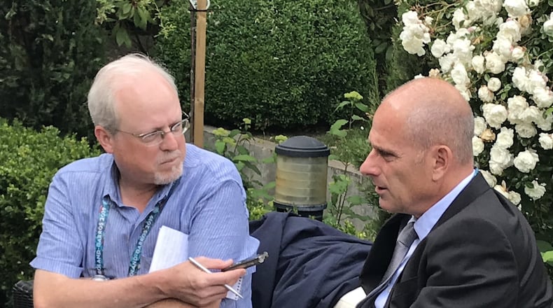 Howard Fendrich, left, Associated Press national sports writer, interviews former French tennis player Guy Forget at the 2019 French Open tennis tournament in Paris. (AP Photo/Andrew Dampf)