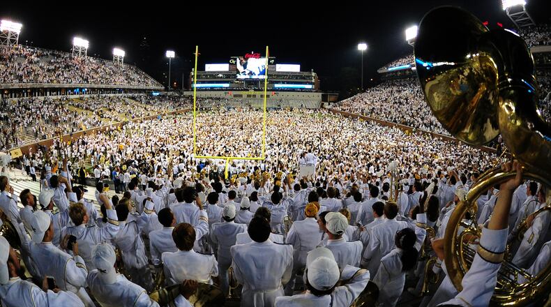 Fans of the Georgia Tech Yellow Jackets cover the field at Bobby Dodd Stadium after defeating Florida State on a blocked field-goal return with no time left on the clock by Lance Austin on October 24, 2015. (Photo by Scott Cunningham/Getty Images)