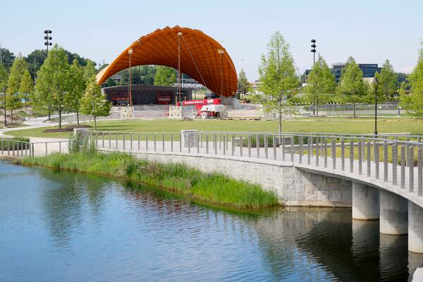 The new bandshell at Assembly Studios in Doraville, shaped like a saddle with a curved skeleton made of mass timber and stainless steel shingles, on Tuesday, June 2, 2026. The park, said to have North America’s largest timber grid amphitheater, will be ready to host a two-day watch event for three World Cup matches: Uruguay vs. Spain, Panama vs. England and Colombia vs. Portugal. After the World Cup, the park will host entertainment events for the community. (Miguel Martinez/AJC)