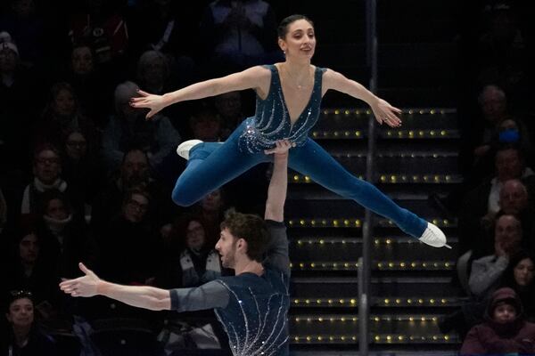 Sara Conti and Niccolo Macii, of Italy, perform during the pairs free skating program at the figure skating world championships, Thursday, March 27, 2025, in Boston. (AP Photo/Charles Krupa)