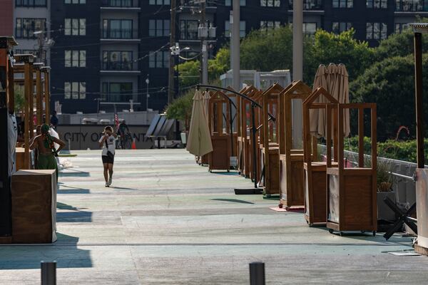 Vendor booths sit empty along the Steele Bridge in downtown Atlanta on Wednesday, June 24, 2026. (Ben Hendren for the AJC)