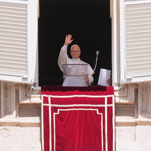 Pope Leo XIV delivers his blessing as he recites the Regina Coeli noon prayer from the window of his studio overlooking St. Peter's Square, at the Vatican, Sunday, May 17, 2026. (AP Photo/Andrew Medichini)