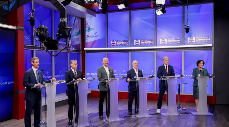 Candidates in California's gubernatorial race look on during a debate Wednesday, April 22, 2026, in San Francisco. (Jason Henry/Pool Photo via AP)