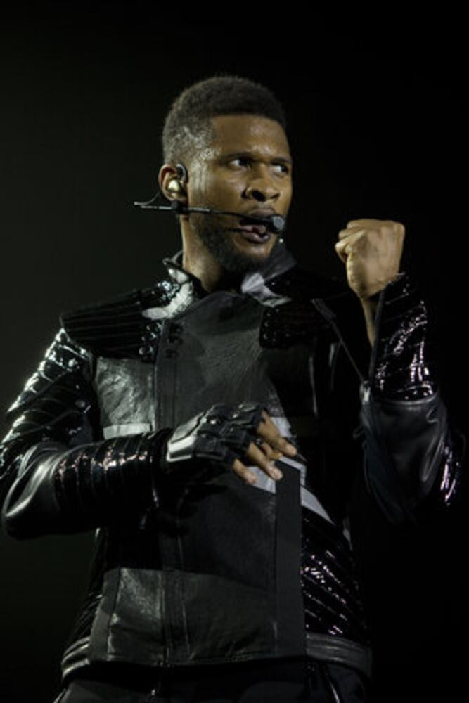 Usher performs in London