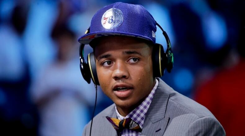 In this June 22, 2017, file photo, Washington's Markelle Fultz answers questions during an interview after being selected by the Philadelphia 76ers as the No. 1 pick overall during the NBA basketball draft in New York. Fultz needed to be helped off the court with an injury to his left ankle in the 76ers' summer league game Saturday, July 8, against Golden State. (AP Photo/Frank Franklin II, File)