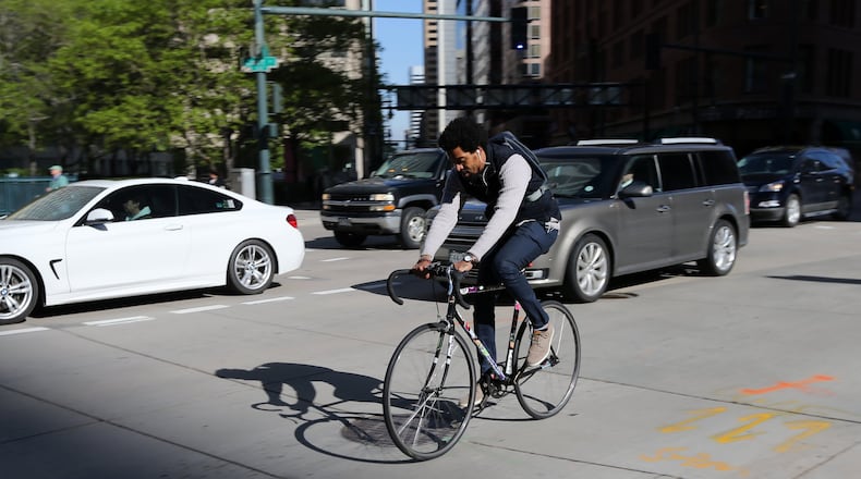 Bicyclists abound in Downtown Denver, which has special bike lanes and pathways to add to the transportation options. Ben Gray / bgray@ajc.com
