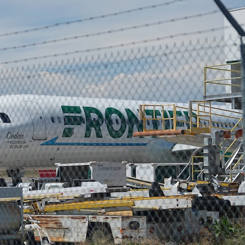 Frontier Airlines jetliner number n646fr sits outside the airlines technical operations center with other jetliners in for service north of Denver International Airport Saturday, May 9, 2026, in Denver. (AP Photo/David Zalubowski)