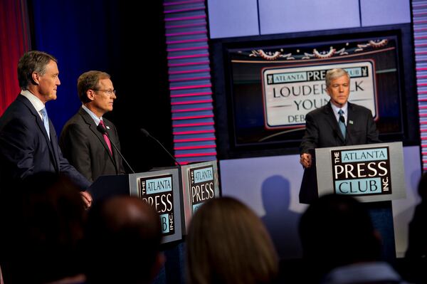 July 13, 2014 Atlanta - U.S. Senate Republican candidates David Perdue (left) and Jack Kingston answer questions from panelists as Dennis O'Hayer moderates during the Atlanta Press Club's Loudermilk-Young Debate Series. AJC/Jonathan Phillips