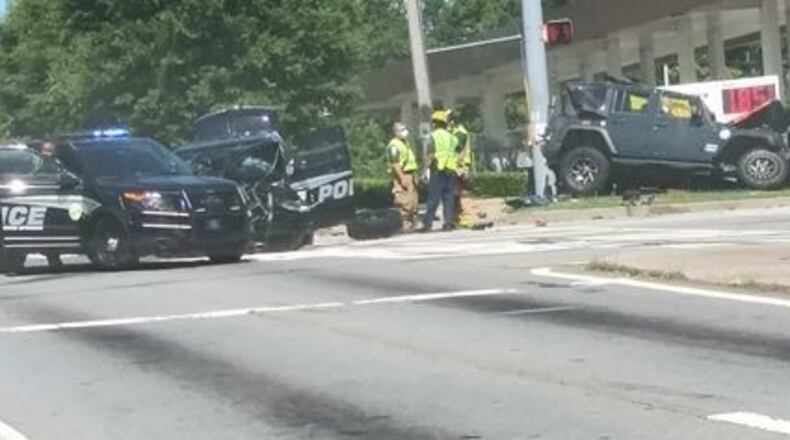 A Powder Springs police officer was involved in a car crash Thursday morning.