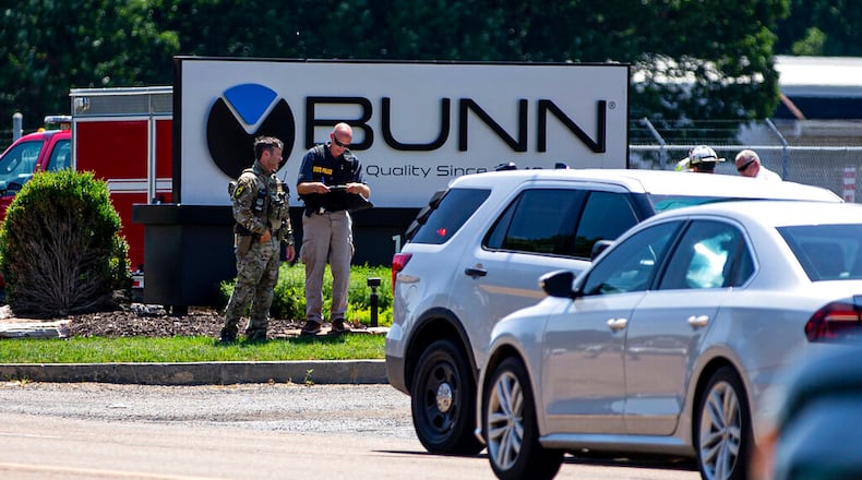 Law enforcement respond to the scene of an active shooter situation at the Bunn-O-Matic warehouse on Stevenson Drive, Friday, June 26, 2020, in Springfield, Ill. Police say officers are searching for a gunman at a warehouse in the Illinois state capital after at least one person was shot and wounded. (Justin L. Fowler/The State Journal-Register via AP)