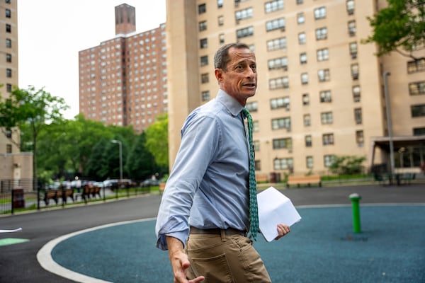 Anthony Weiner campaigns at a building in the Lower East Side, Thursday, May 29, 2025, in New York, by knocking on doors and talking to residents about his bid for New York City Council (AP Photo/Angelina Katsanis)