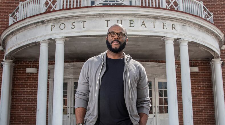 Tyler Perry (photographed in front of Tyler Perry Studios in Fort McPherson) is producing new seasons of eight existing shows and has launched a new series, all for BET. (Hyosub Shin/AJC FILE)