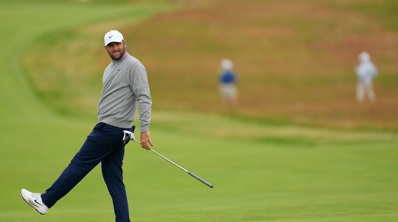 Scottie Scheffler reacts after missing a putt on the third hole during the first round of the U.S. Open golf tournament at Shinnecock Hills Golf Club in Southampton, N.Y., Thursday, June 18, 2026.(AP Photo/David J. Phillip)