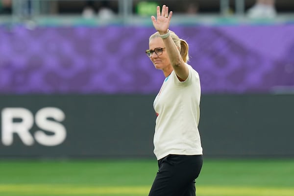 England head coach Sarina Wiegman waves prior the Women's Euro 2025, group D, soccer match between England and Wales at Arena St. Gallen in St. Gallen, Switzerland, Sunday, July 13, 2025. (AP Photo/Martin Meissner)