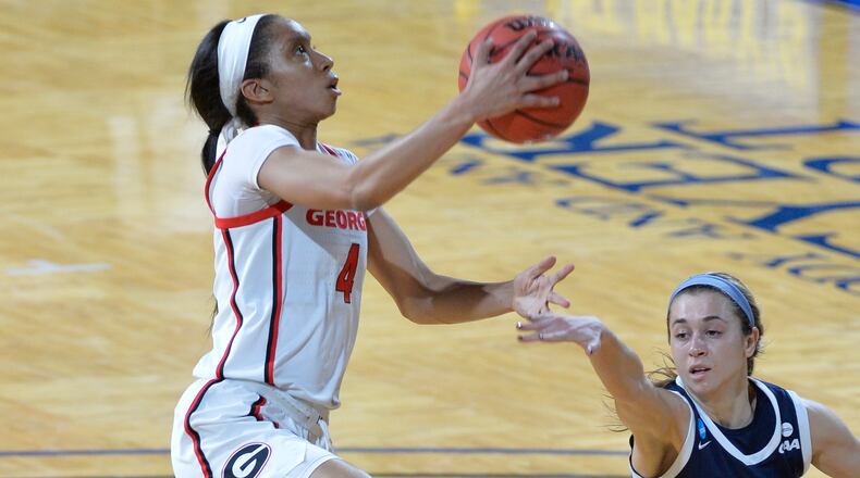 Georgia guard Mikayla Coombs (4) goes for the layup against Drexel in the first round of the NCAA Tournament Monday, March 22, 2021, in San Antonio, Texas. (Mark Sobhani/UGA)