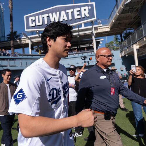 Los Angeles Dodgers two-way player Shohei Ohtani arrives to talk to reporters during DodgerFest at Dodger Stadium in Los Angeles, Saturday, Jan. 31, 2026. (AP Photo/Jae C. Hong)