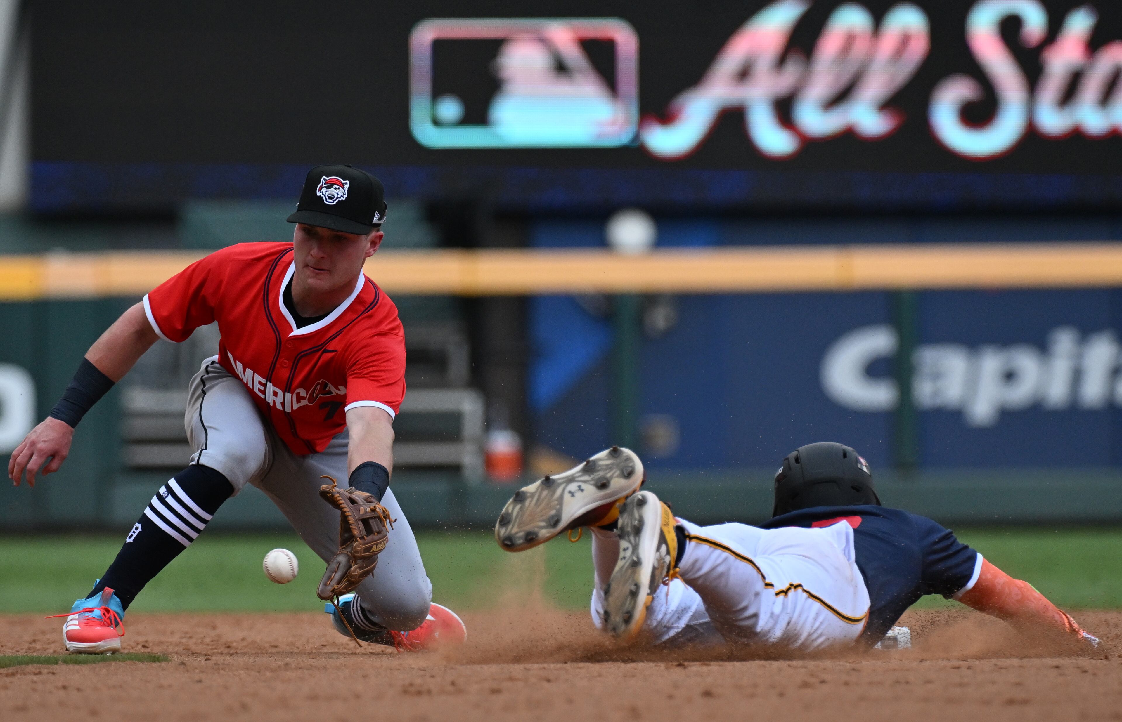 American League second baseman Kevin McGonigle (7) tags out National League infielder Konnor Griffin (22) during the third inning of the All-Star Futures Game at Truist Park, Saturday, July 12, 2025, in Atlanta. National League won 4-2 over American League. (Hyosub Shin / AJC)