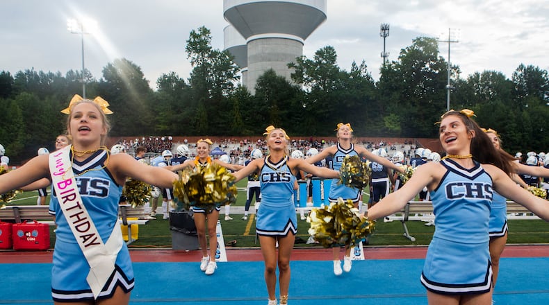 Cambridge cheerleaders cheer during the Cambridge v. Alpharetta high school football game on Friday, September 2, 2022, at Cambridge High School in Milton, Georgia. CHRISTINA MATACOTTA FOR THE ATLANTA JOURNAL-CONSTITUTION.