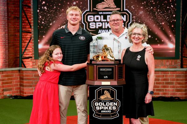Georgia catcher Daniel Jackson celebrating with his family after winning the 2026 Golden Spikes Award on June 29. (Conor Dillon/UGAAA)