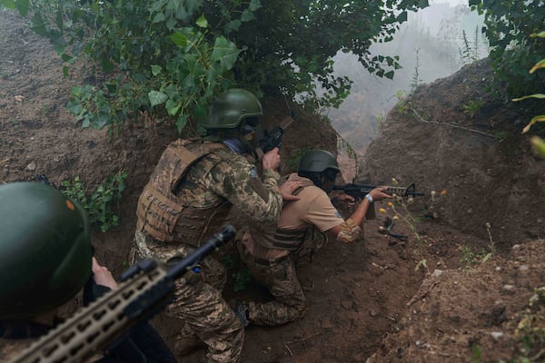 Ukrainian 3rd Assault Brigade recruits train at the polygon in Kyiv region, Ukraine, on Wednesday, July 16, 2025. (AP Photo/Evgeniy Maloletka)